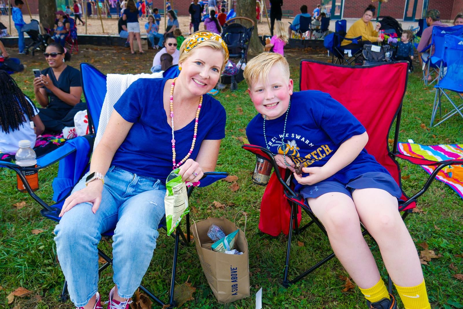 mom and boy in chairs smiling